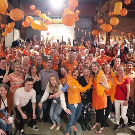 king's day celebration with lively orange themed gathering