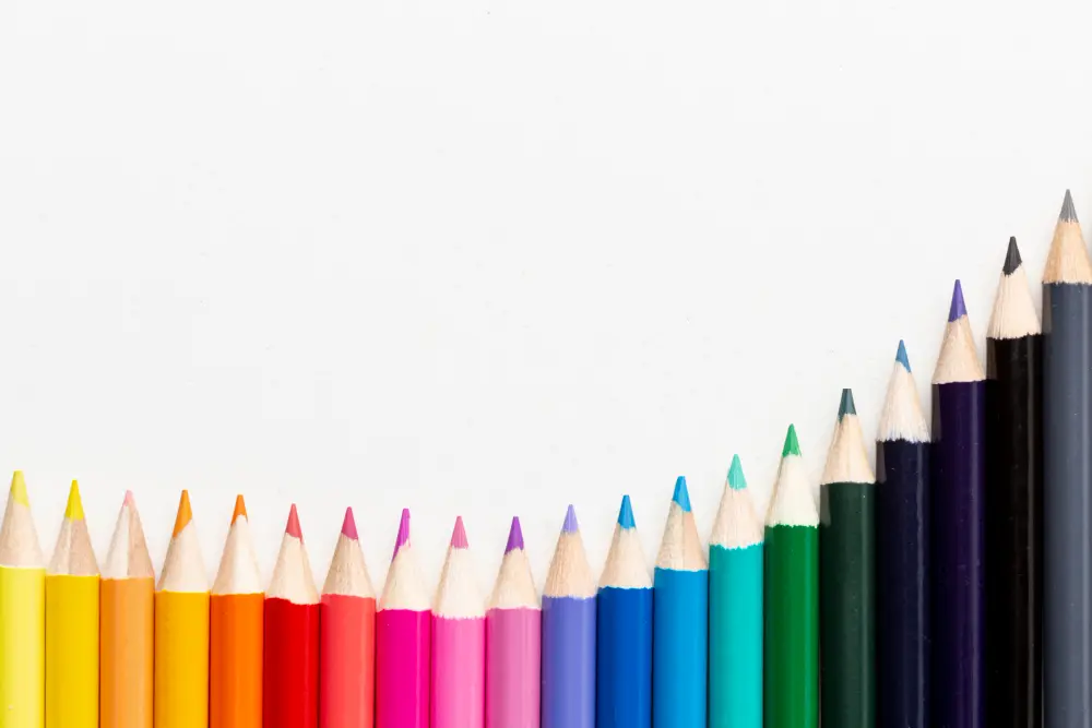 rainbow colored pencils arranged in ascending order